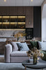 a living room filled with furniture and decor