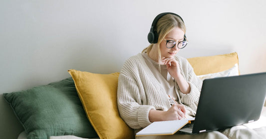 Photo of Woman Taking Notes