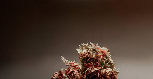 Red and White Flowers on White Ceramic Vase