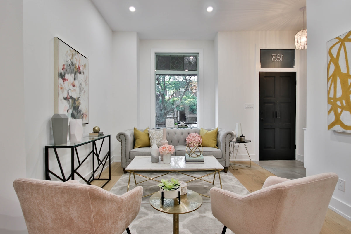 a living room filled with furniture and a fire place
