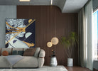 a living room with a large painting on the wall