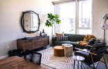 a living room with a couch and a table