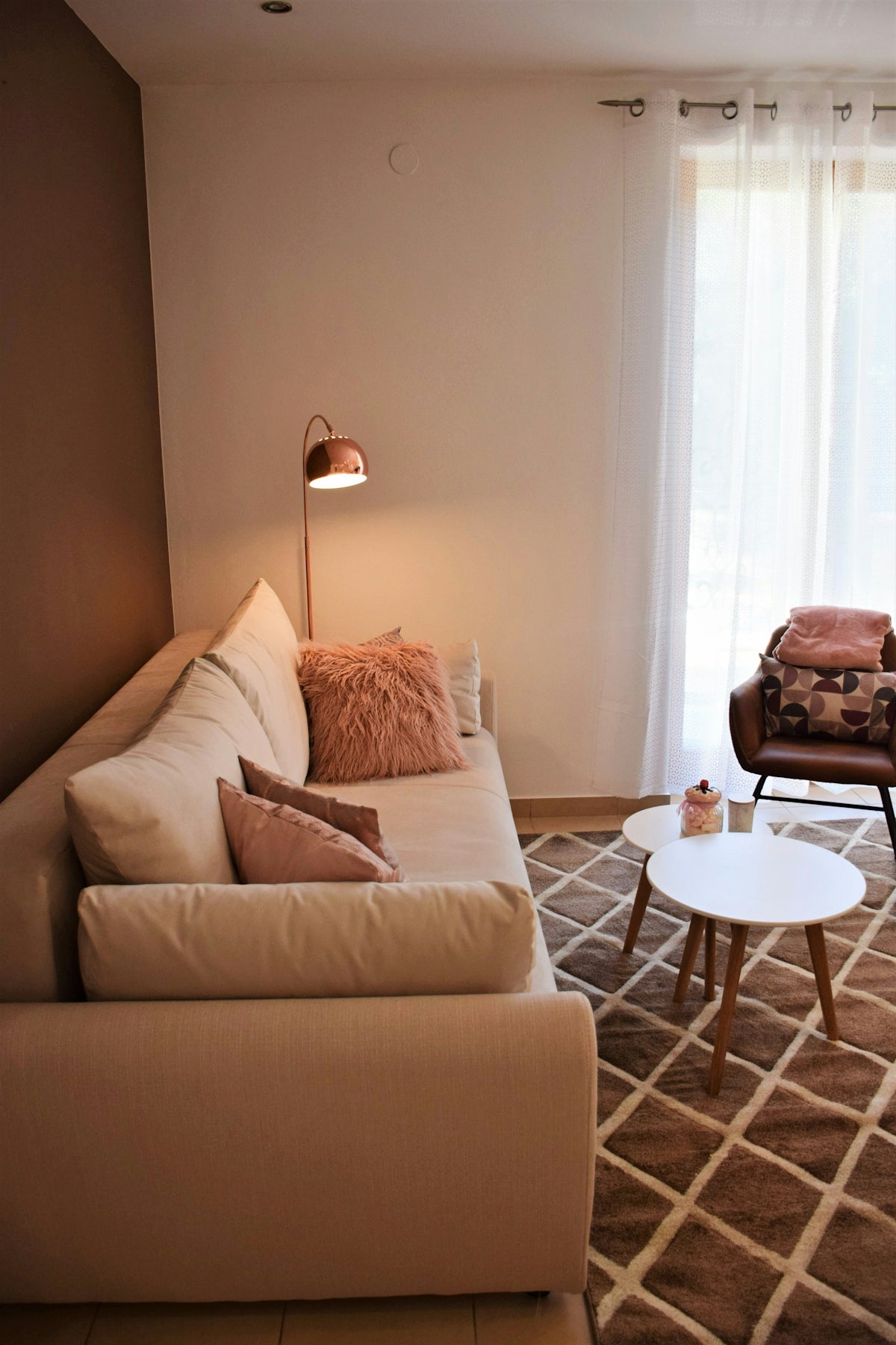 a living room with a couch and a table