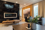a living room with a couch a table and a television
