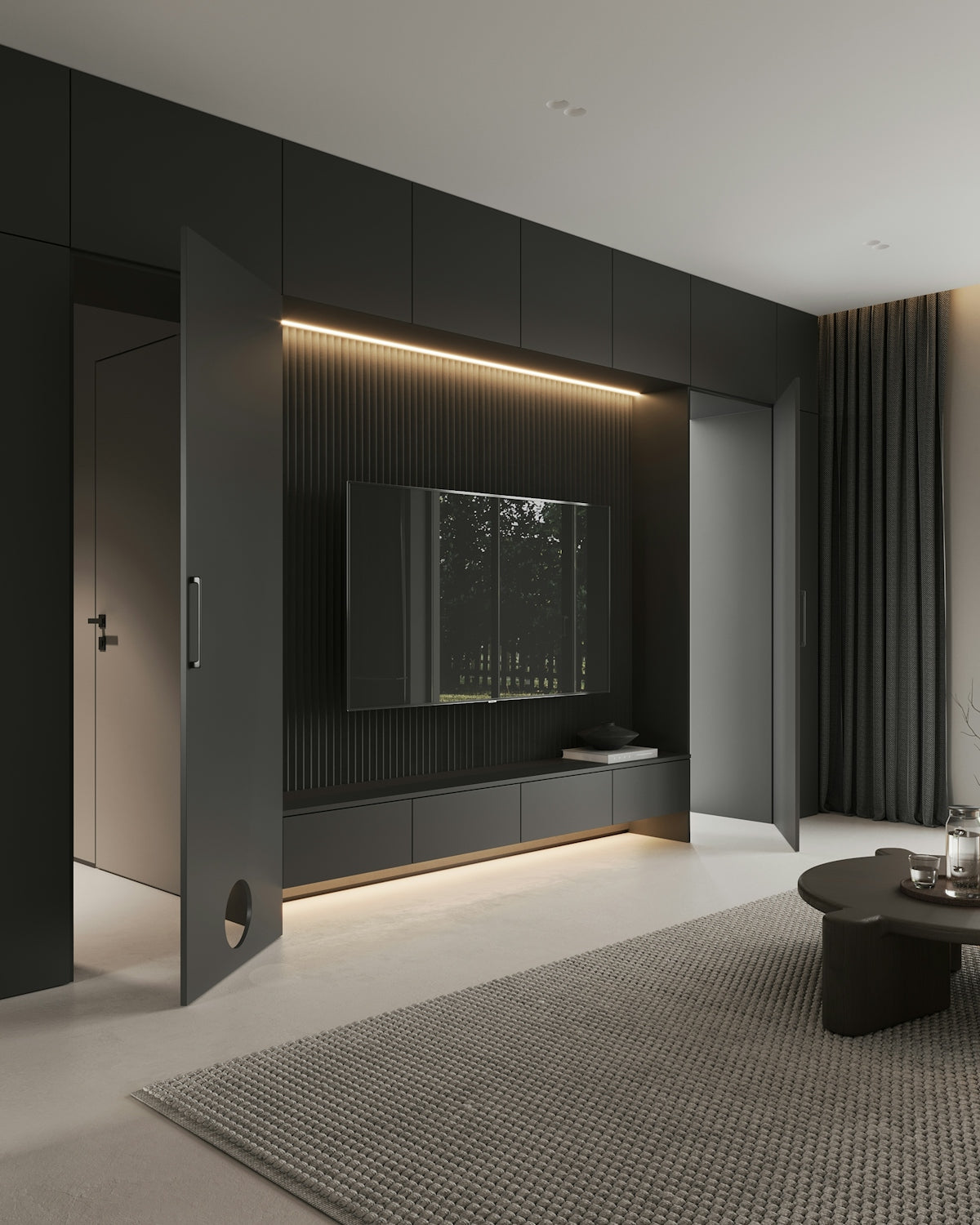 A living room with a couch, coffee table and television