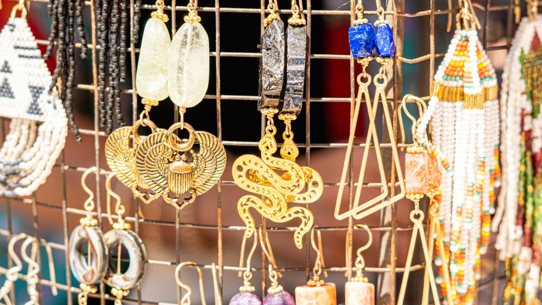 Jewelry display with various earrings and necklaces.