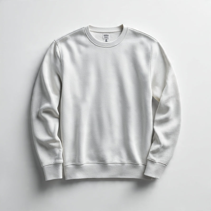 “A folded men’s sweatshirt centered on a pure white seamless background. Straight-on studio shot with soft lighting and a clean shadow. No text, no logo, no model, no props.”