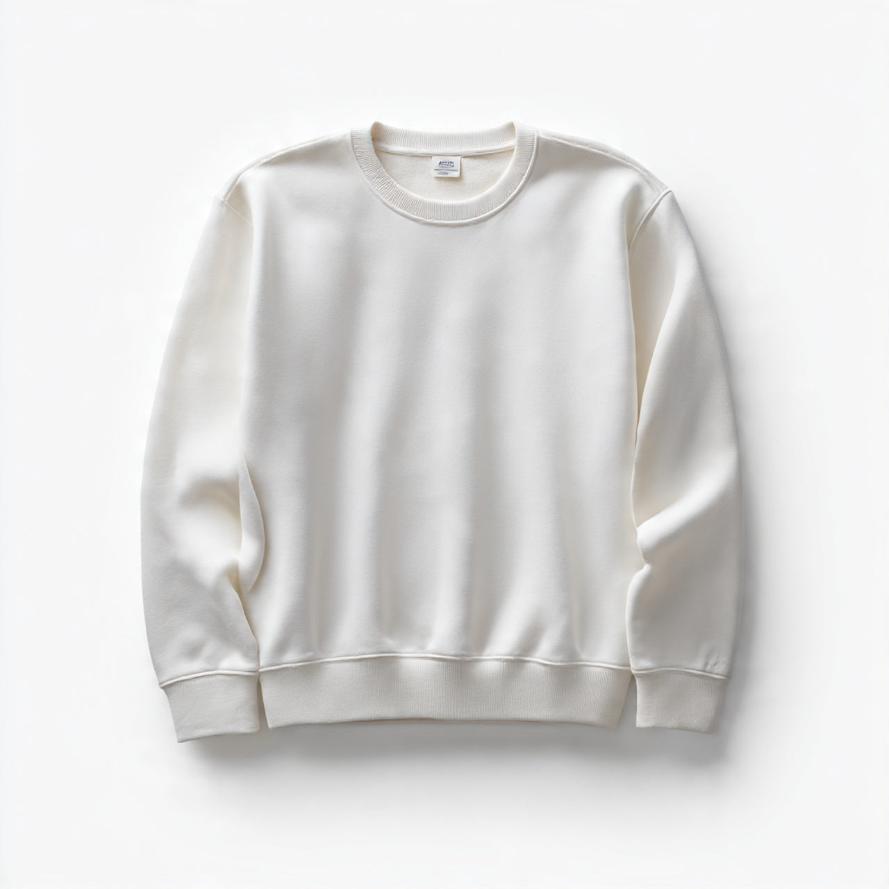 “A folded women’s sweatpants pair centered on a pure white seamless background. Straight-on product shot with soft studio lighting. No text, no logo, no model, no props.”