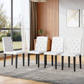4-pack white PU dining chairs: ergonomic buckle backrest, 35 inches high, black metal legs,Combines Comfort and Texture.Perfectly suitable for family dining rooms, hotel banquet halls,etc.