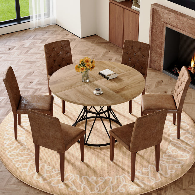 Table and chair set. A wood MDF table with a diameter of 47.3 inches,black hourglass shaped metal brackets.Paired with 6 Brown Suede Fabric Chairs:Features a decorative button-tufted backrest.