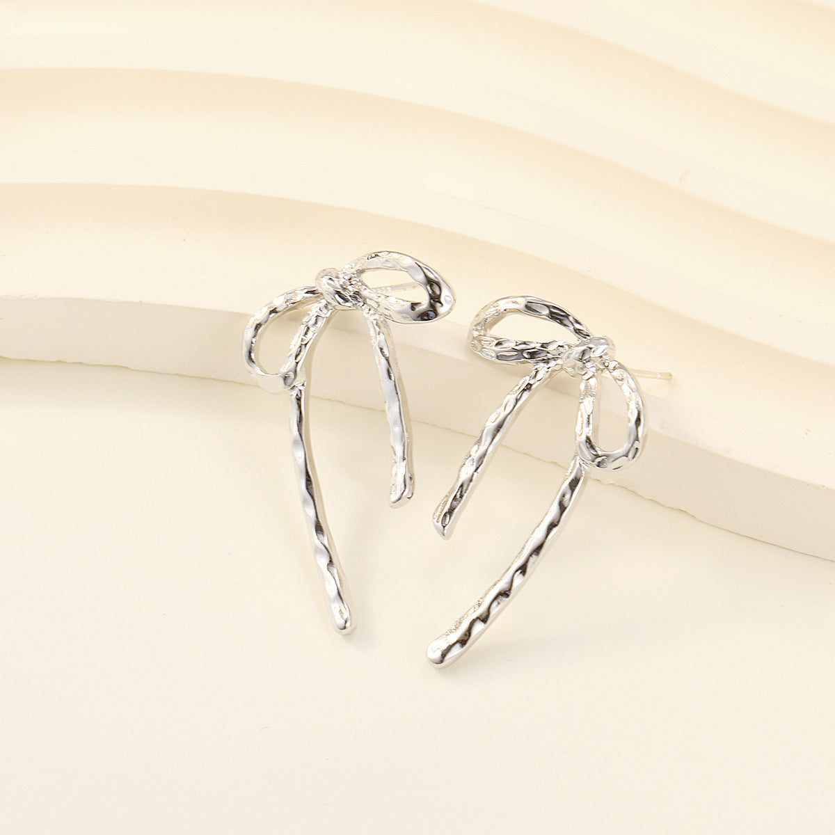 Women's Retro Irregular Metal Bow Earrings