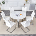 Table and chair set.A 42-inch stainless steel leg round table .Paired with 6 Uniquely designed White Dining Chairs With Silver Metal Leg.Sintered Stone Tabletop,Stainless Steels Table Legs.