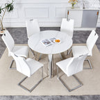 Table and chair set.A 42-inch stainless steel leg round table .Paired with 6 Uniquely designed White Dining Chairs With Silver Metal Leg.Sintered Stone Tabletop,Stainless Steels Table Legs.