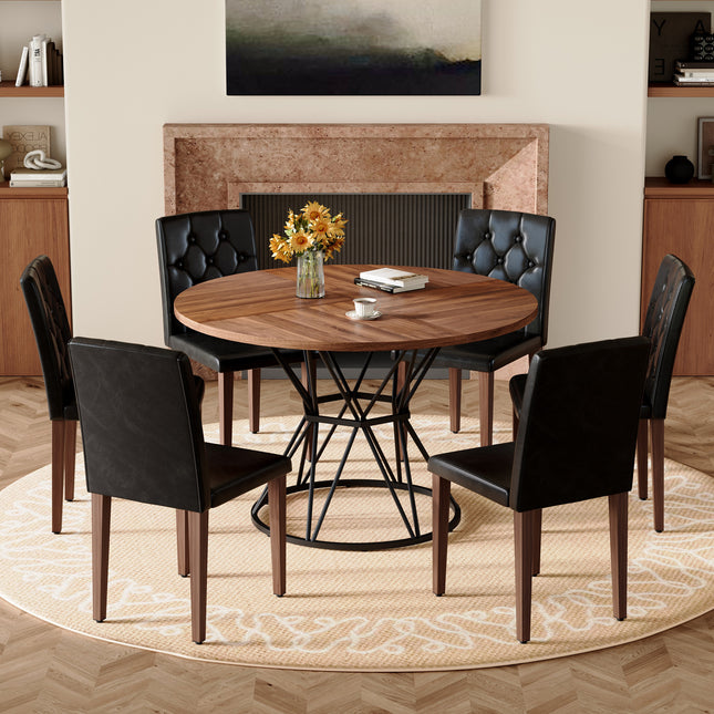 Table and chair set.A circular walnut MDF dining table with a diameter of 47.3 inches,black hourglass shaped metal brackets.Paired with 6 Black PU chairs with decorative buckle design on the backrest.