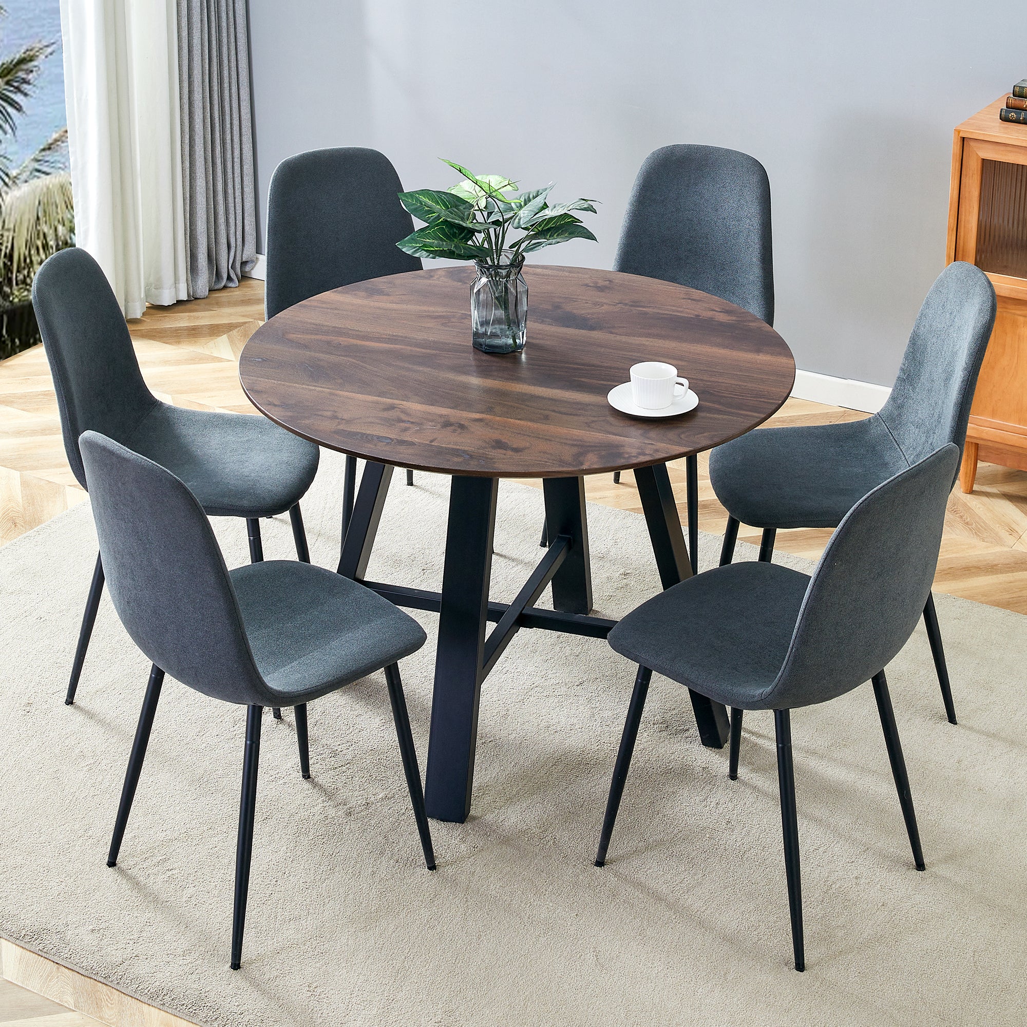 Table and chair set.42 Inch Diameter Modern minimalist round dining table.Paired with 6 Dark Gray Linen Fabric Chairs.Iron Pipe Spraying Chair Legs. Suitable for kitchen,Dining room,etc.