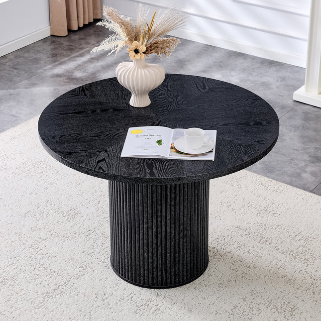 A modern spliced circular dining table with a diameter of 42 inches, featuring black wood color textures fan-shaped diagonal color splicing board design, interpreting home aesthetics and practicality.