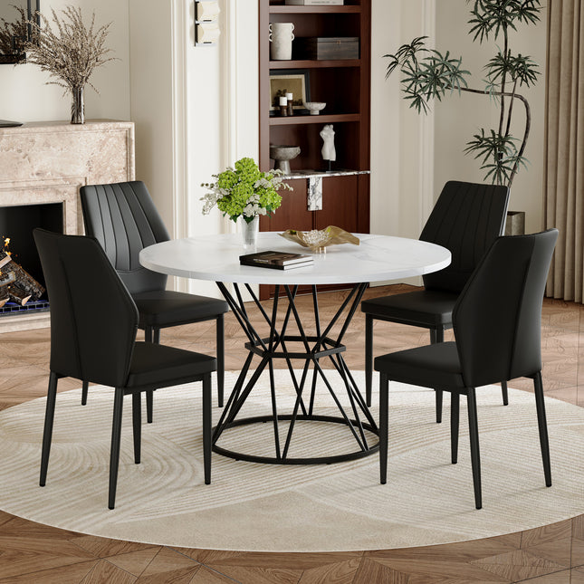 Table and Chair Set.A white MDF table with a diameter of 47.3 inches,black hourglass shaped metal brackets. Paired with 4 Black PU Dining Chairs, 37 inches High, Ergonomic PU Backrest.