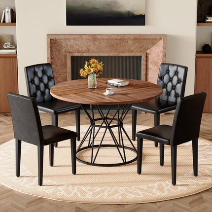 Table and chair set. A circular walnut MDF dining table with a diameter of 47.3 inches,black hourglass shaped metal brackets.Paired with 4 black PU dining chairs: ergonomic buckle backrest.