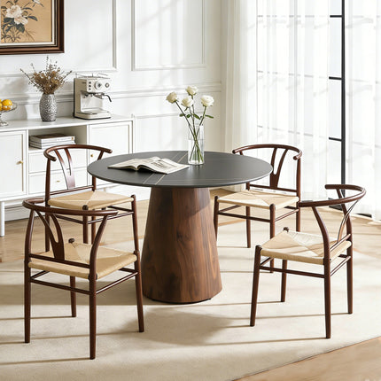 Table and chair set. A 42 inch rock slab round table, paired with four uniquely designed dining chairs with walnut coloer metal legs. The table legs are made of walnut density board material.