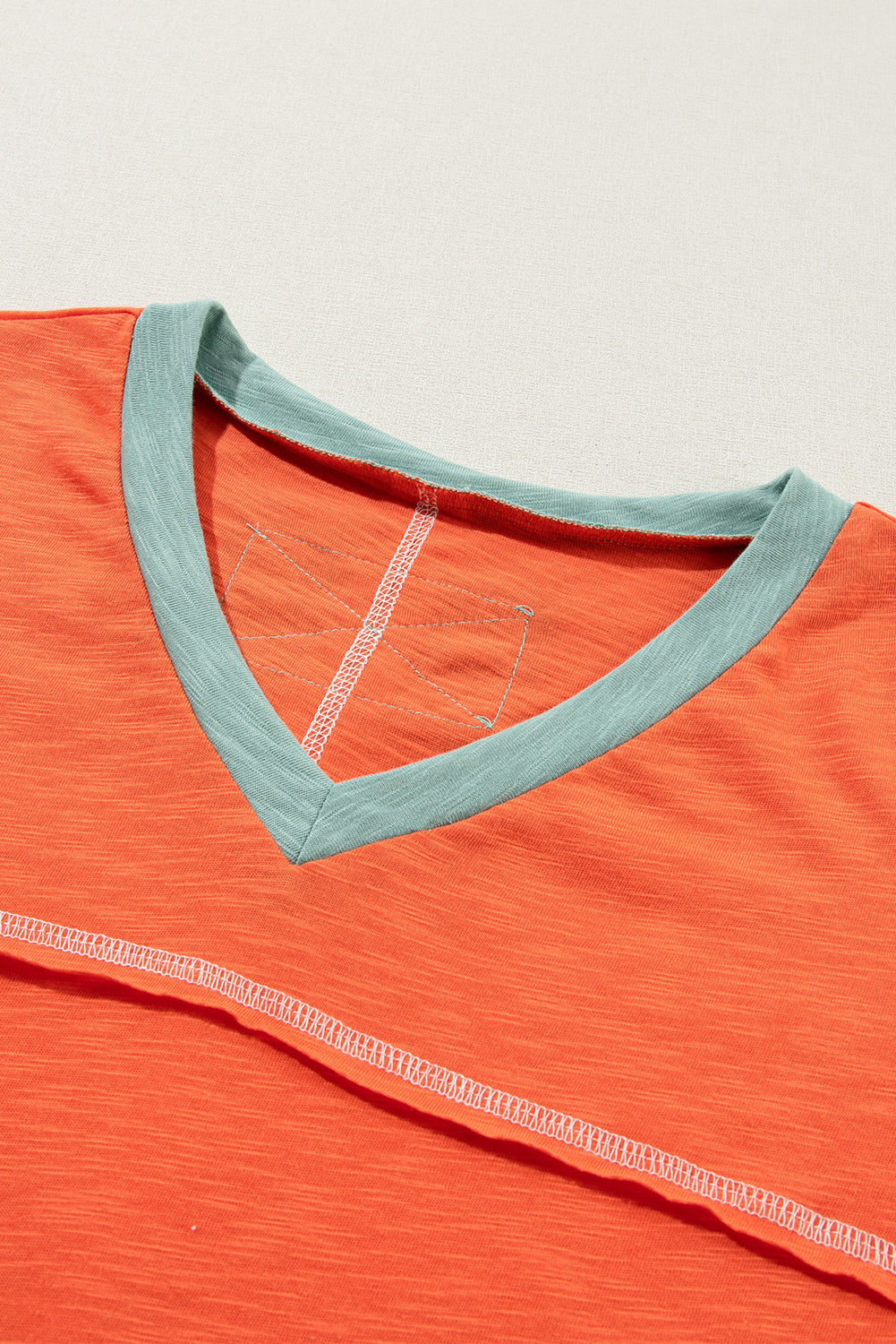 Grapefruit Orange Contrast Trim Exposed Seam V Neck T Shirt - Eloy Royal