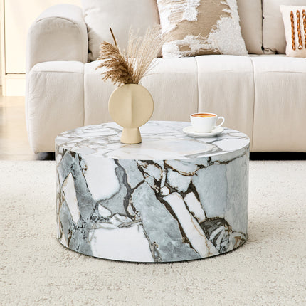 A simple white marble textured cylindrical coffee table, 23.6 inches in diameter x 11.8 inches in height, MDF material living room furniture. Suitable for industrial style or minimalist living rooms.
