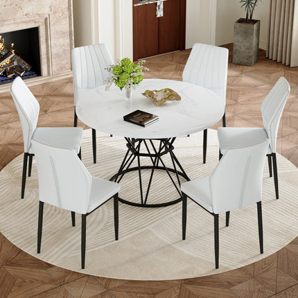 Table and Chair Set.A white MDF table with a diameter of 47.3 inches,black hourglass shaped metal brackets. Paired with 6 white PU Dining Chairs, 37 inches High, Ergonomic PU Backrest.