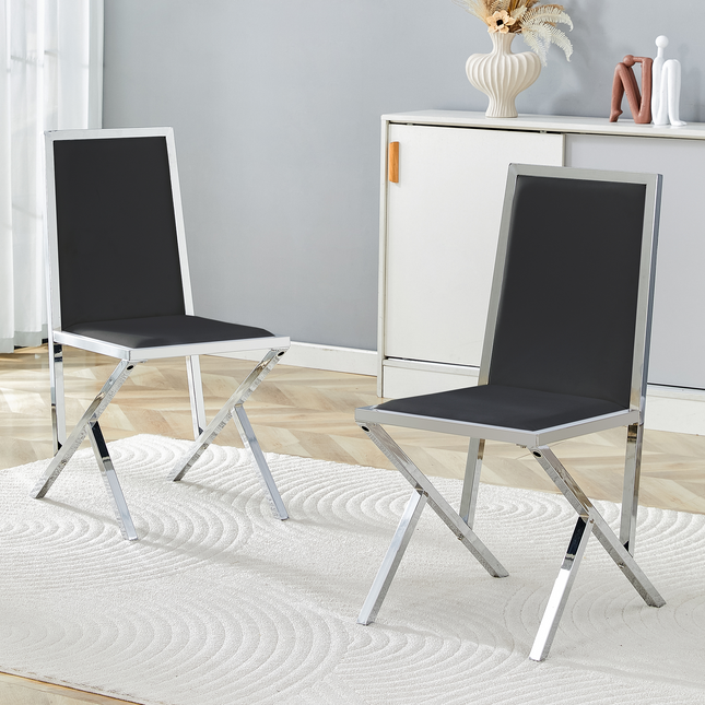 2-pack silver metal framed BLACK PU dining chairs: ergonomic design, a simple and luxurious choice.Featuring uniquely designed silver metal legs.
