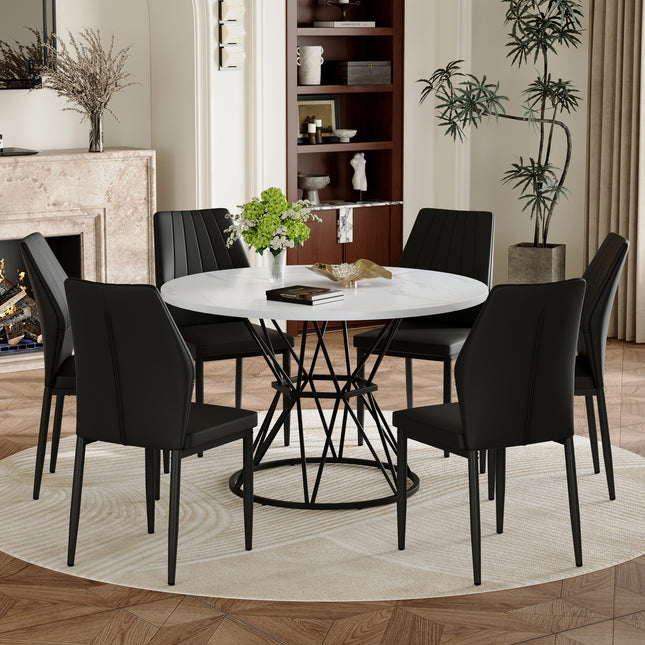 Table and Chair Set.A white MDF table with a diameter of 47.3 inches,black hourglass shaped metal brackets. Paired with 6 Black PU Dining Chairs, 37 inches High, Ergonomic PU Backrest.