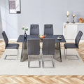 Table and chair set.63'x31.5x30' Black Marble-Patterned Slabs Tabletop with Stainless Steel Butterfly Legs.Paried with 6 Dark gray high-quality PU chairs with silver metal legs.