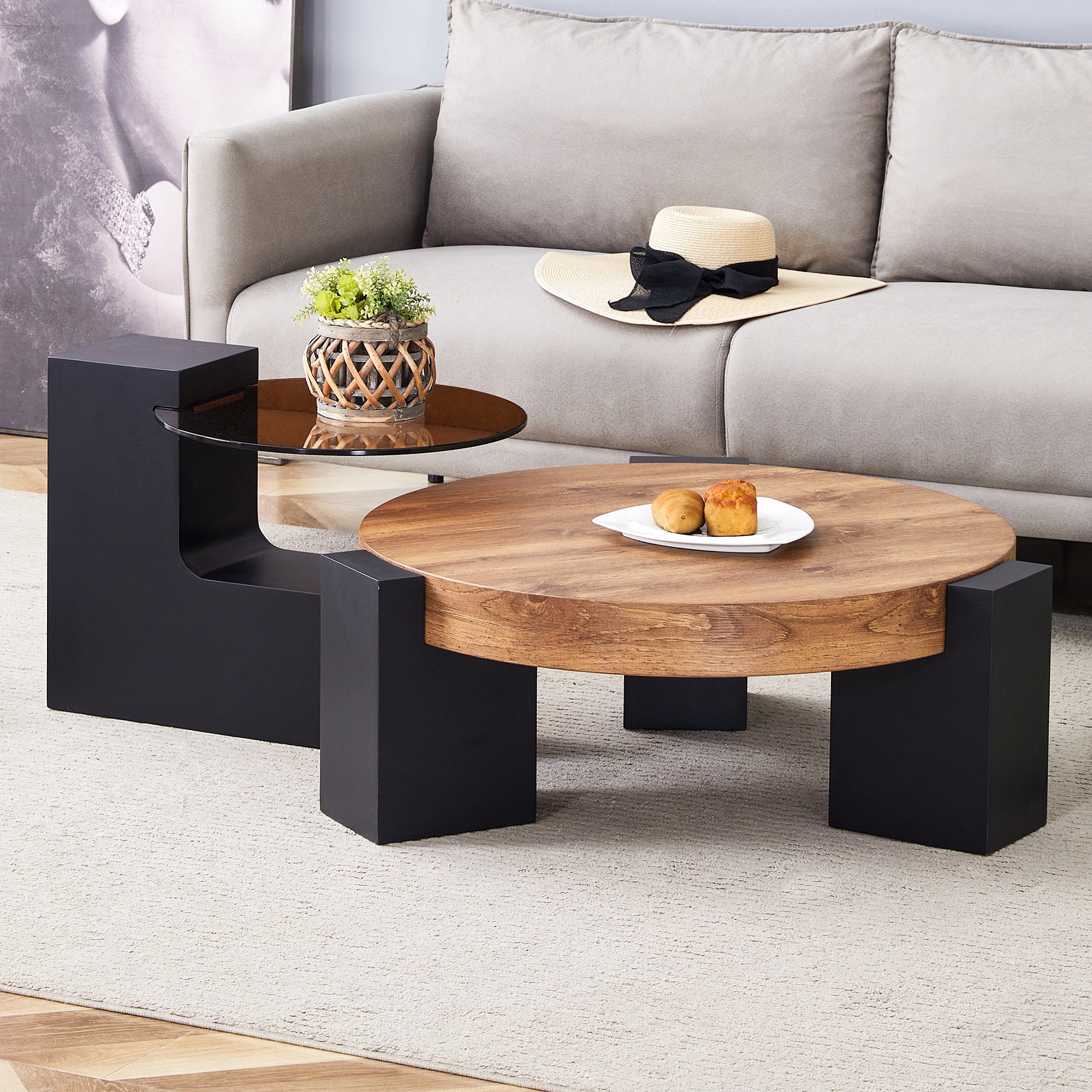 Modern Simple Double-Layer Round Coffee Table - Transparent Brown Glass Top with Black MDF L-Shaped Legs.The detachable design can make the use of space more flexible.