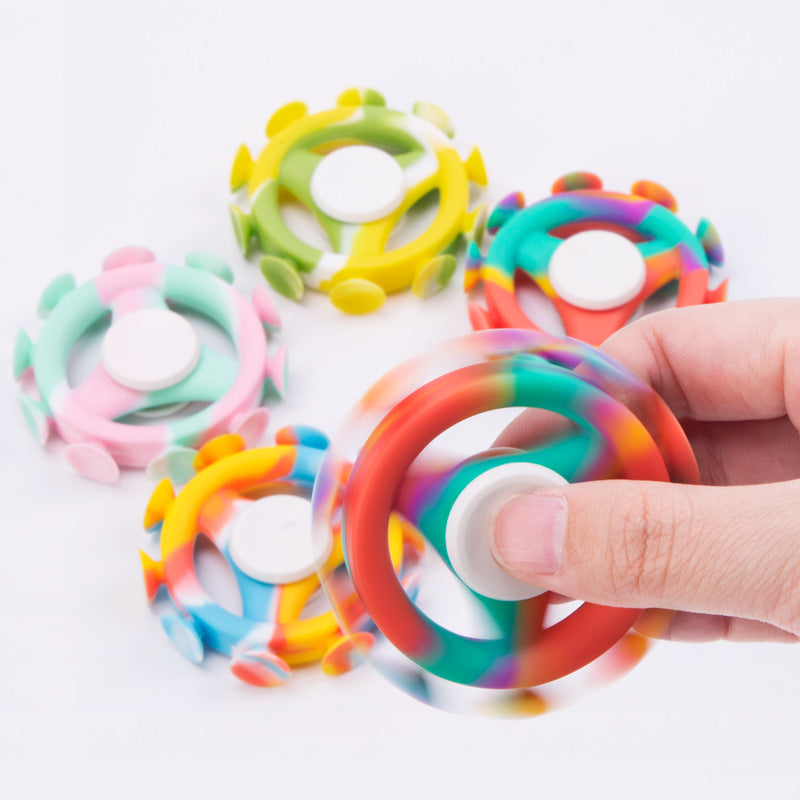 Sucker Rotating Fingertip Gyro Silicone Toy