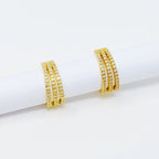 Triple Shine Huggie Earrings