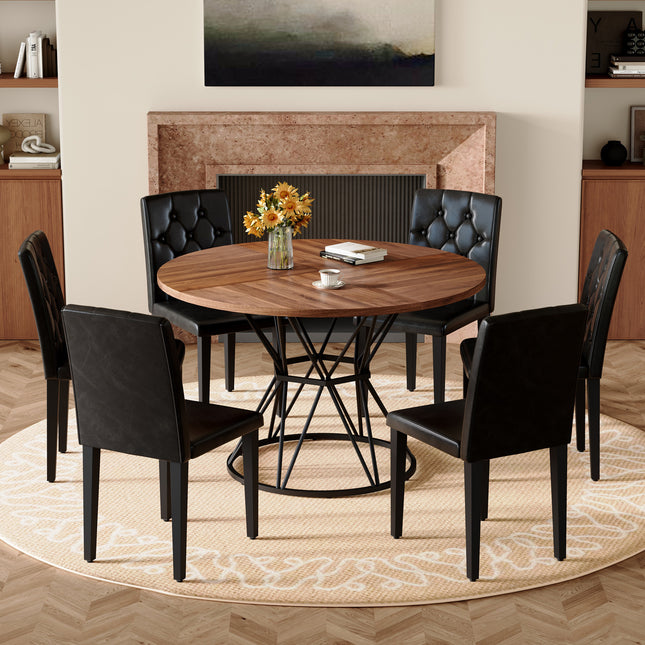 Table and chair set. A circular walnut MDF dining table with a diameter of 47.3 inches,black hourglass shaped metal brackets.Paired with 6 black PU dining chairs: ergonomic buckle backrest.