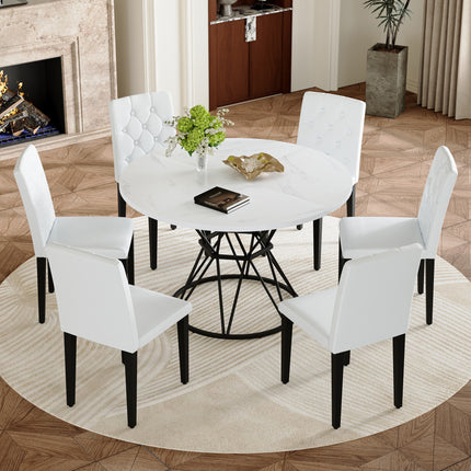 Table and chair set. A circular white MDF dining table with a diameter of 47.3 inches,black hourglass shaped metal brackets.Paired with 6 white PU dining chairs: ergonomic buckle backrest.