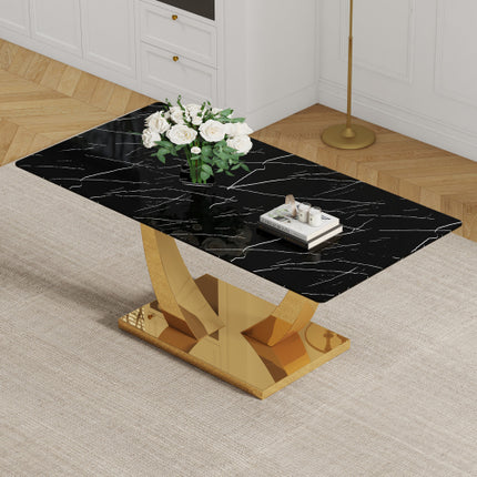 Modern simple rectangular dining table with black patterned top and smooth gold legs. Suitable for kitchen, dining room and living room.
