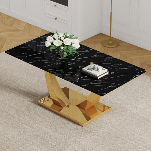 Modern simple rectangular dining table with black patterned top and smooth gold legs. Suitable for kitchen, dining room and living room.