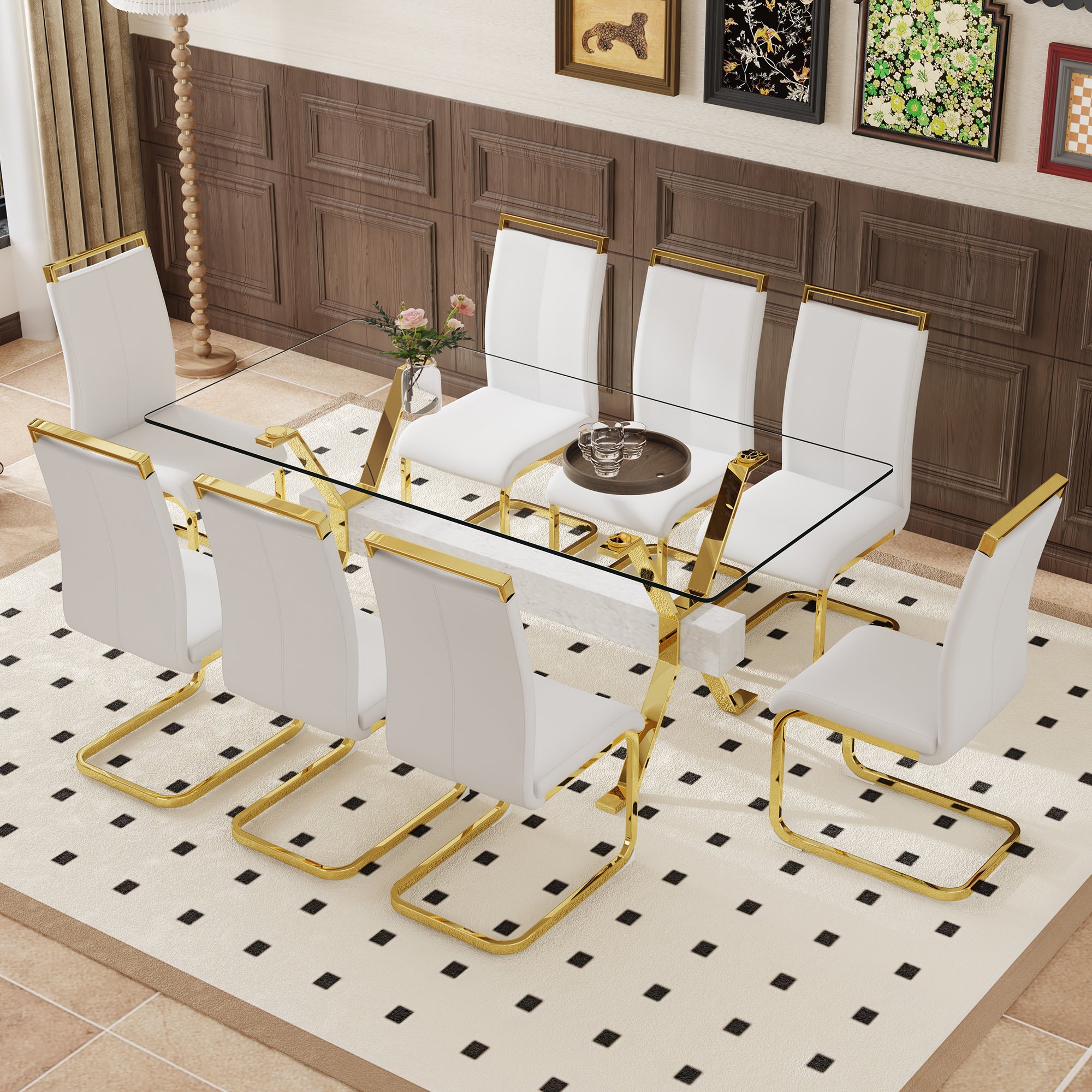Table and chair set.Elegant Transparent Tempered Glass Dining Set - 71'x35.4' with 8 White PU Chairs with golden C-tube metal leg.