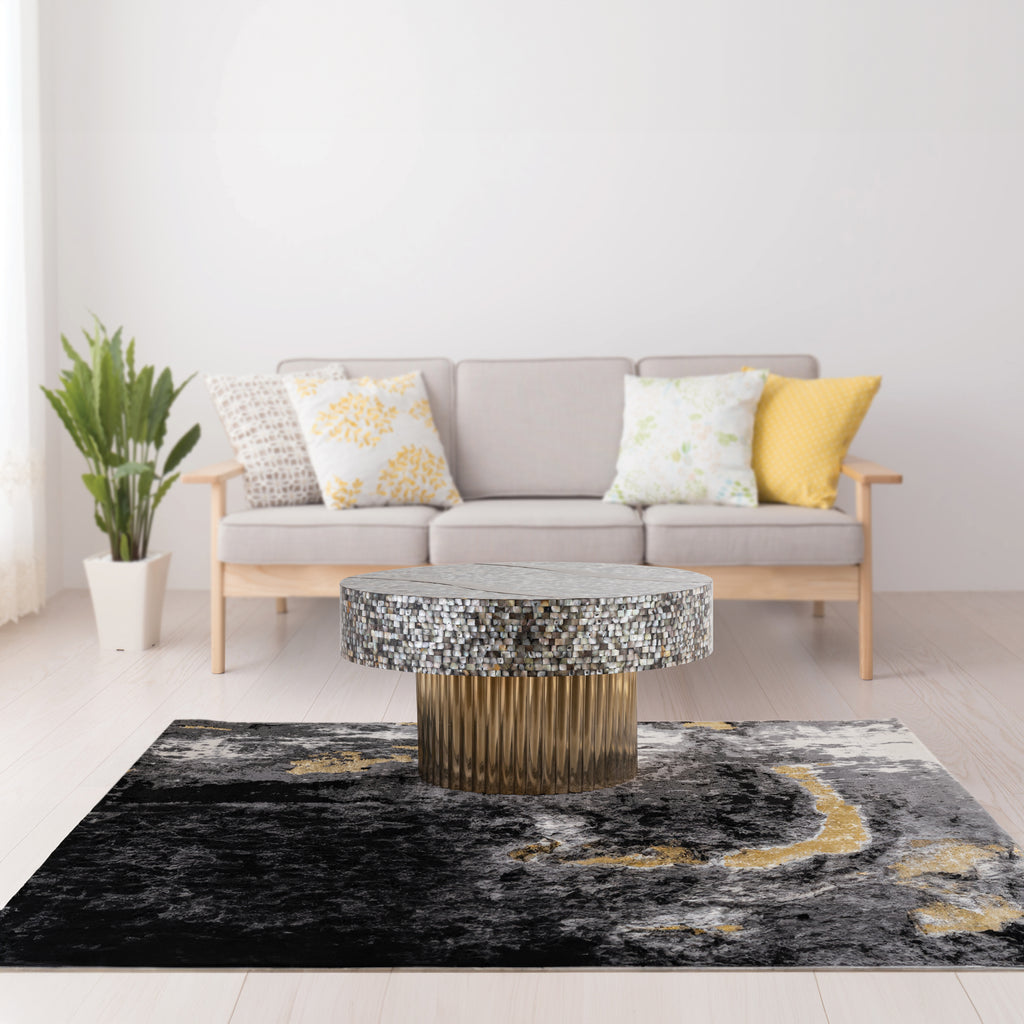 Nacre round mother-of-pearl coffee table with antique brass base