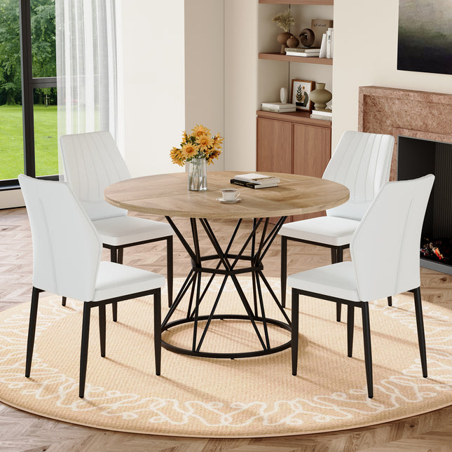 Table and Chair Set.A wood MDF table with a diameter of 47.3 inches,black hourglass shaped metal brackets. Paired with 4 white PU Dining Chairs, 37 inches High, Ergonomic PU Backrest.