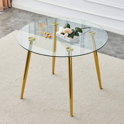 A glass tabletop with a diameter of 40 inches and a modern minimalist circular dining table with electroplated golden metal legs.Suitable for living rooms, and conference rooms.W1151S02857