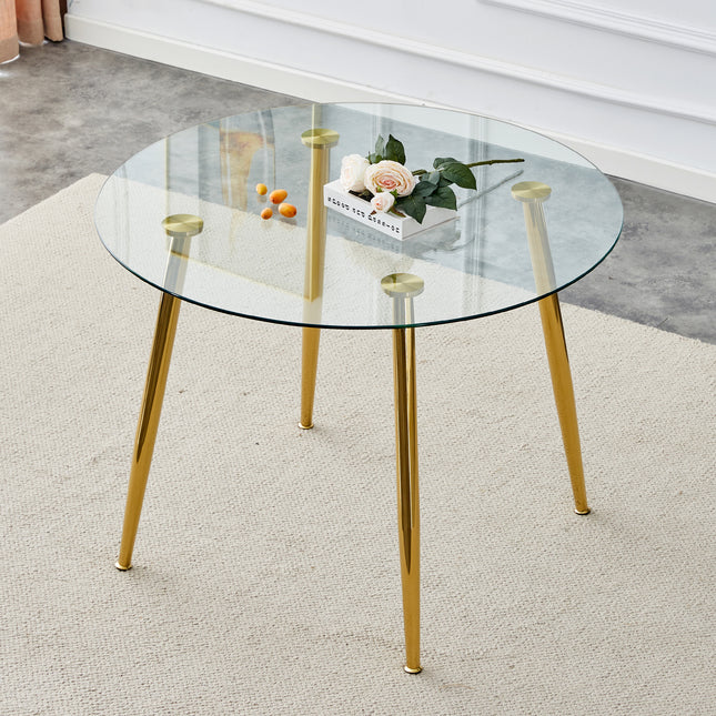 A glass tabletop with a diameter of 40 inches and a modern minimalist circular dining table with electroplated golden metal legs.Suitable for living rooms, and conference rooms.W1151S02857
