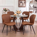 Table and chair set. A 38.6 inch glass round table, paired with four uniquely designed dining chairs with black metal legs. The table legs are made of walnut density board material.